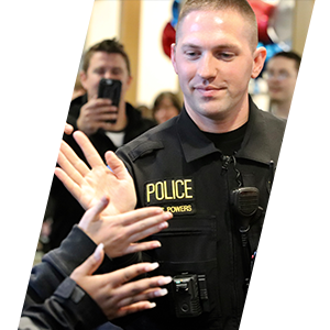 Sliding header image showing a Tulalip police officer at a press event