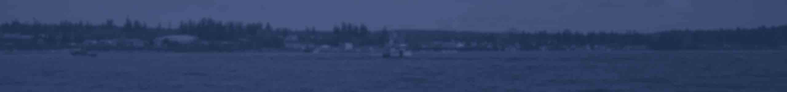 Tulalip Tribal Police Department Fish & Wildlife boat patrolling waters background header image.