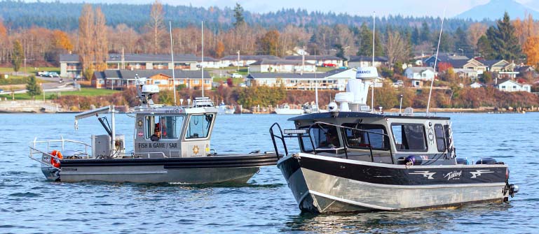 Tulalip Tribal Police Department Fish & Wildlife image of patrolling boats in the bay. 