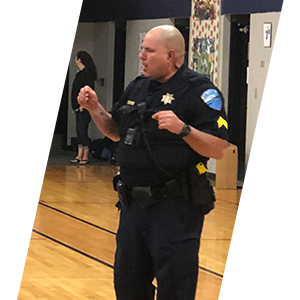 Tulalip Tribal Police officer presenting to the community header sliding image.